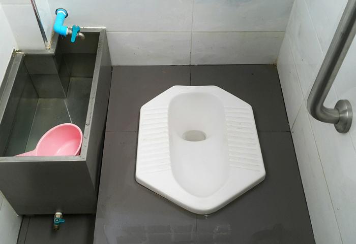 Indian Toilet Seat with Water